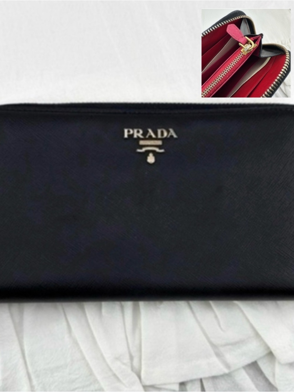 AUTHENTIC Prada wallet. Black with pink interior.